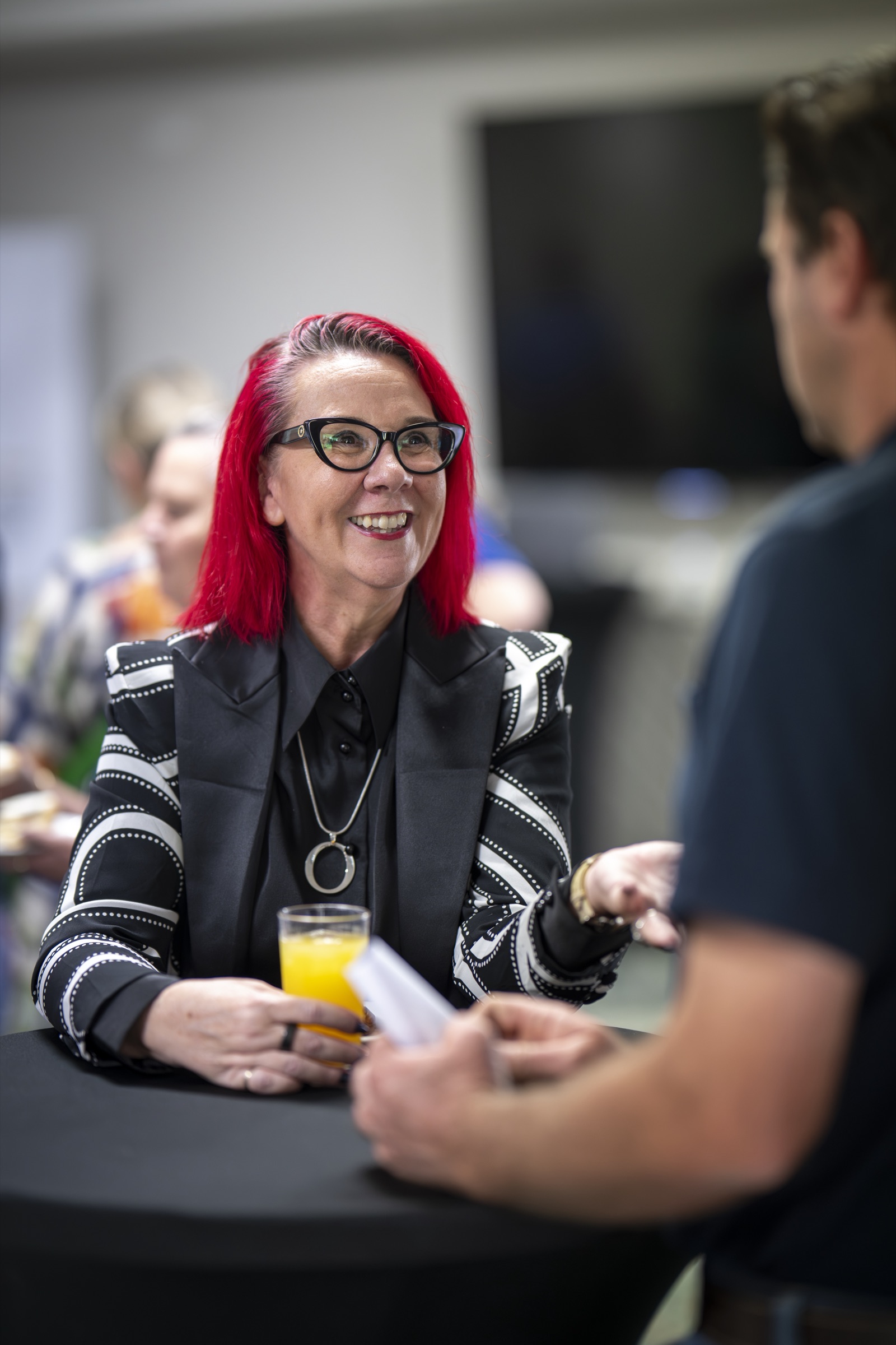 Tracy Sheen in conversation with a delegate at the Western Downs Business Summit